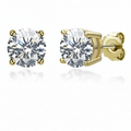 Gold stud earrings with clear gemstones on a white background