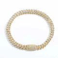 Gold chain necklace with clear stones on a white background