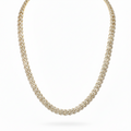 Gold necklace with a white background