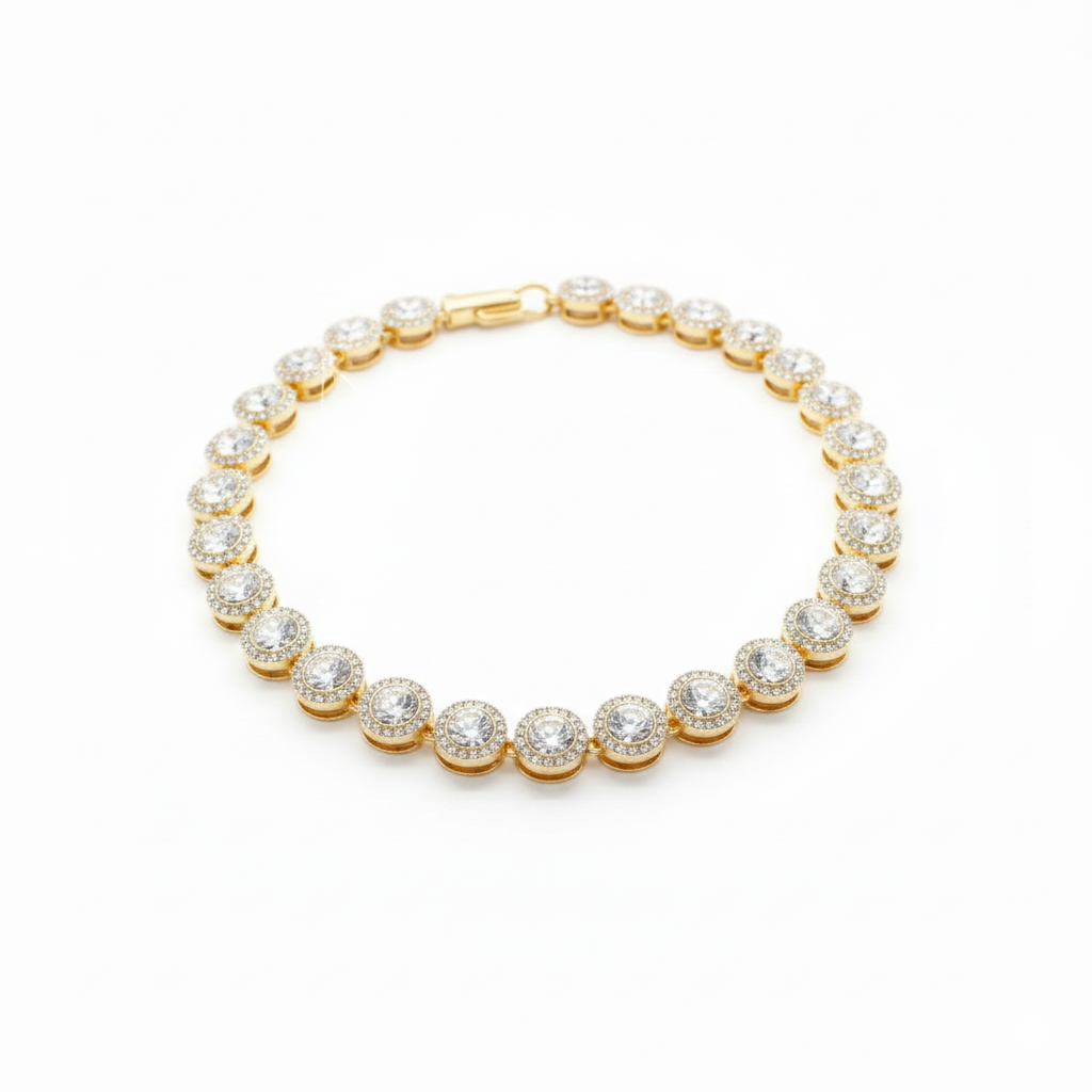 Gold Necklace with clear gemstones on a white background