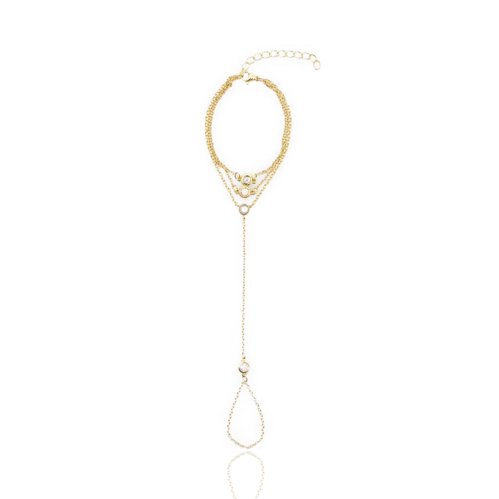 Gold Bracelet with multiple pendants on a white background