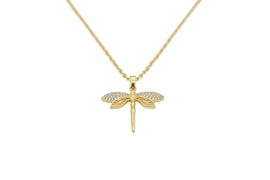 Gold dragonfly necklace on a white background