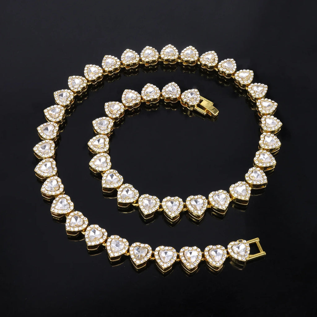Gold bracelet with heart-shaped diamond stones on a black background