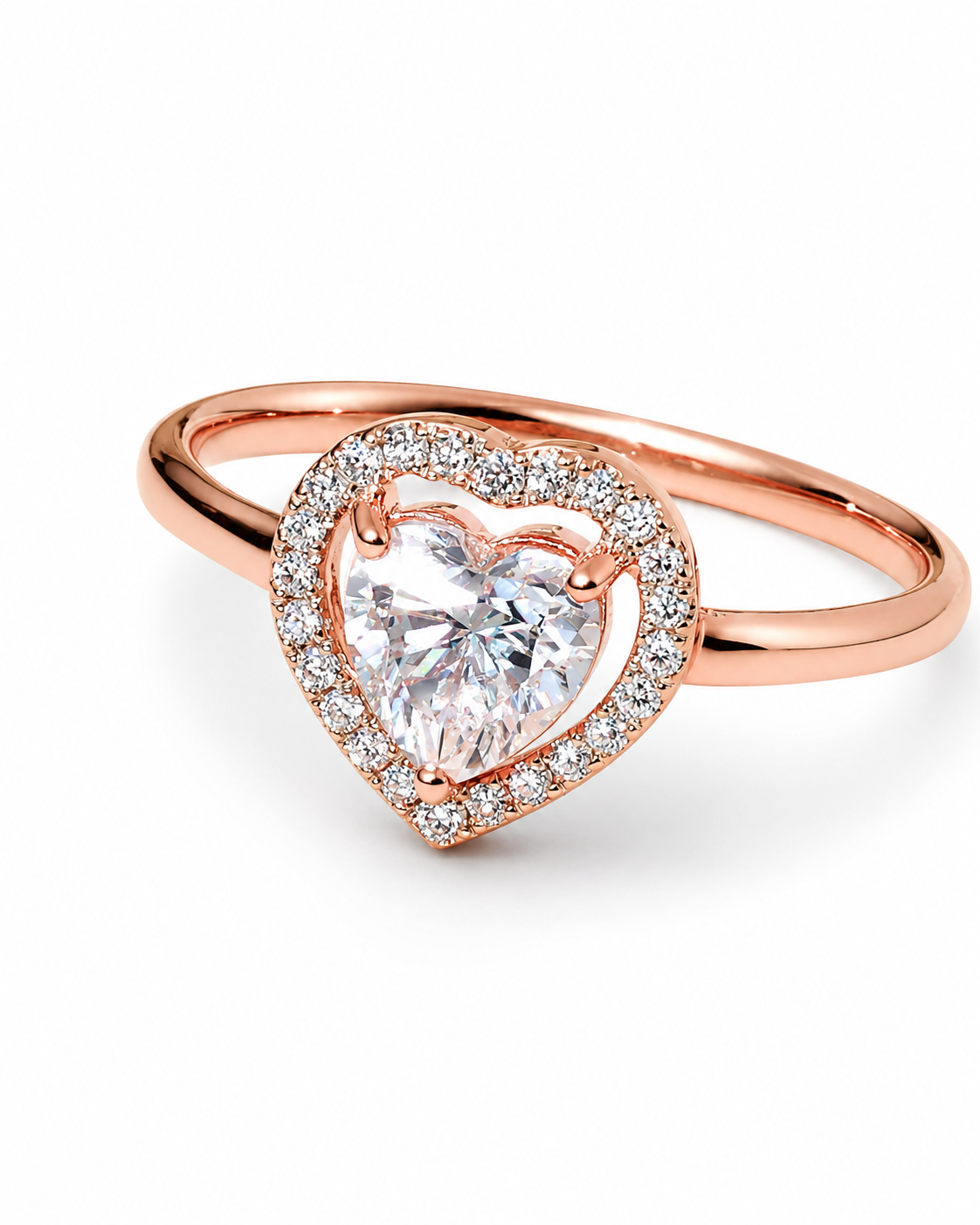 Rose gold ring with a heart-shaped diamond on a white background