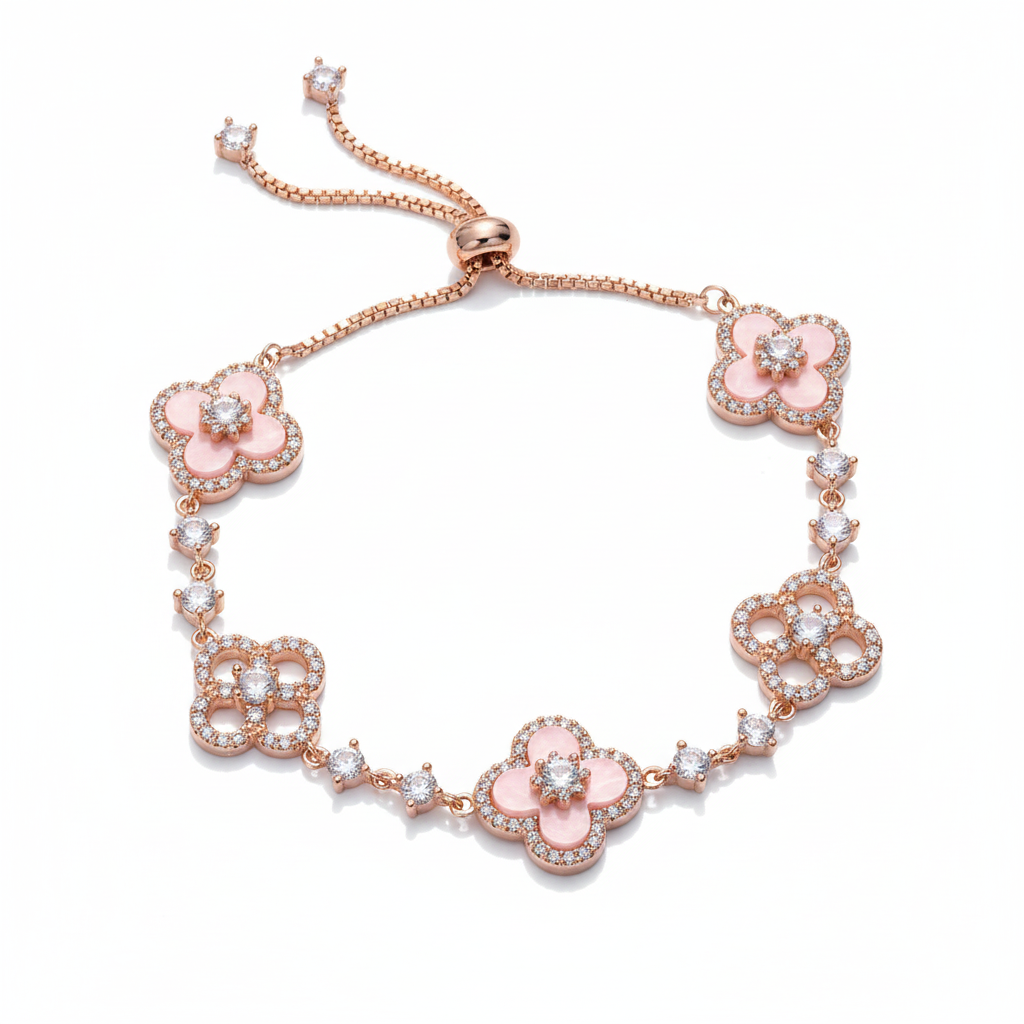 Rose gold bracelet with pink floral charms on a white background
