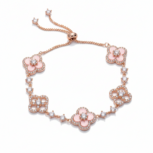Rose gold bracelet with pink floral charms on a white background