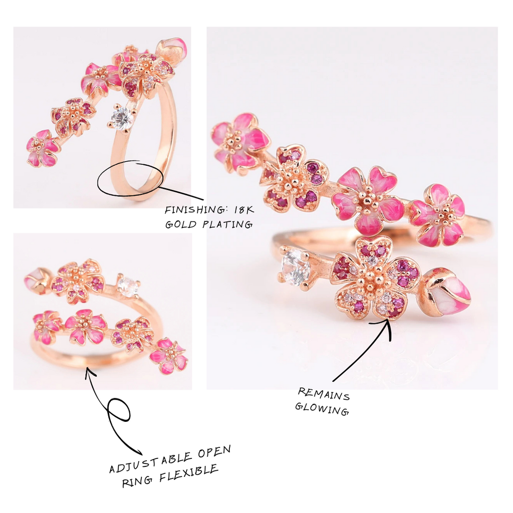 Floral ring with pink gemstones and gold plating, shown on a white background.