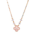 Necklace with a pink clover-shaped pendant on a white background