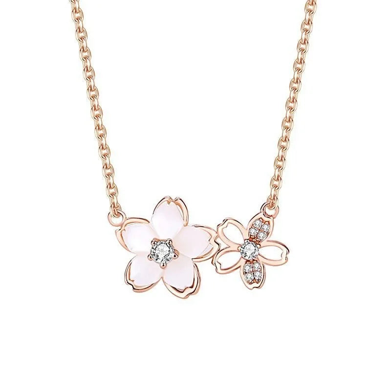 Necklace with floral pendants on a white background