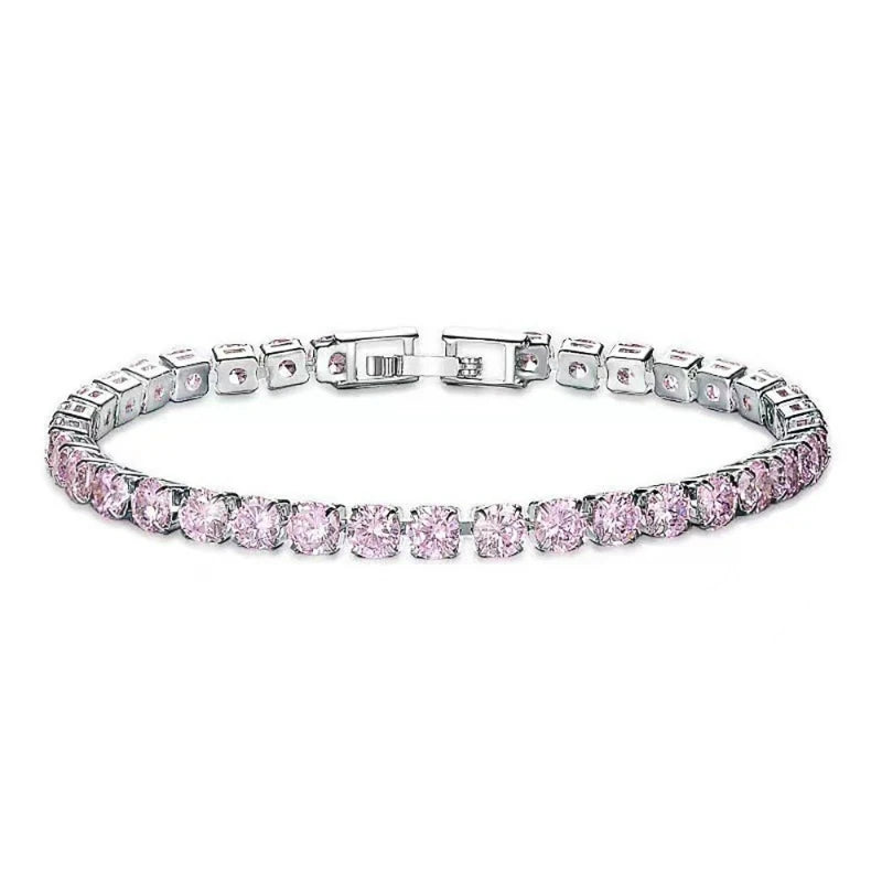 Silver bracelet with pink gemstones on a white background