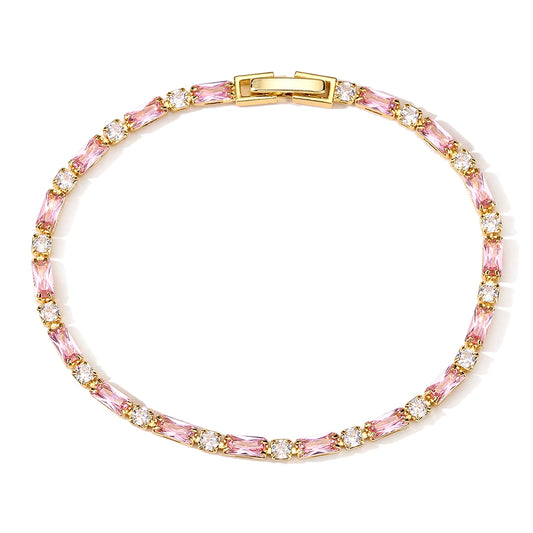 Bracelet with pink and gold beads on a white background