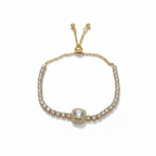 Gold bracelet with diamond accents on a white background