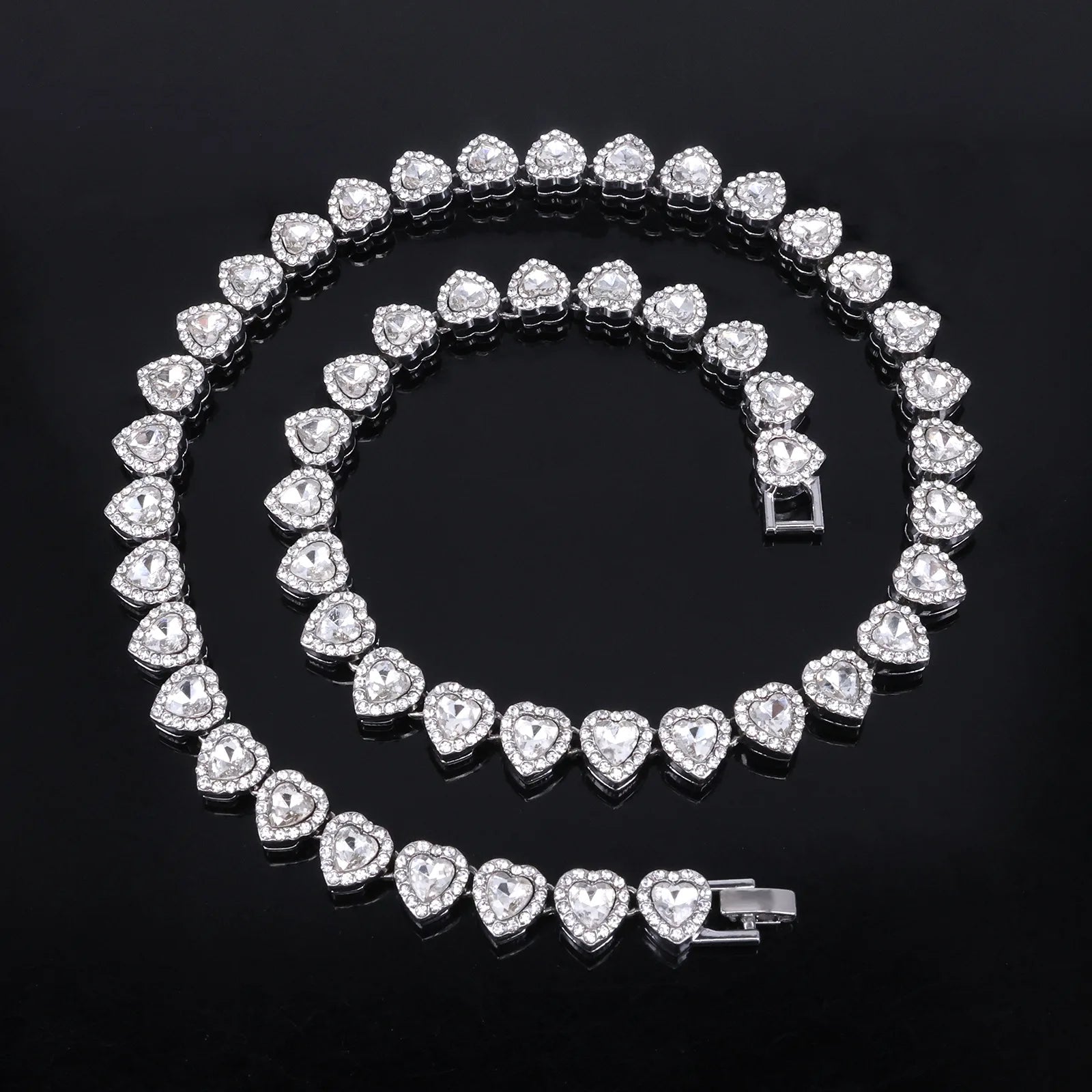 Heart-shaped diamond bracelet on a black background