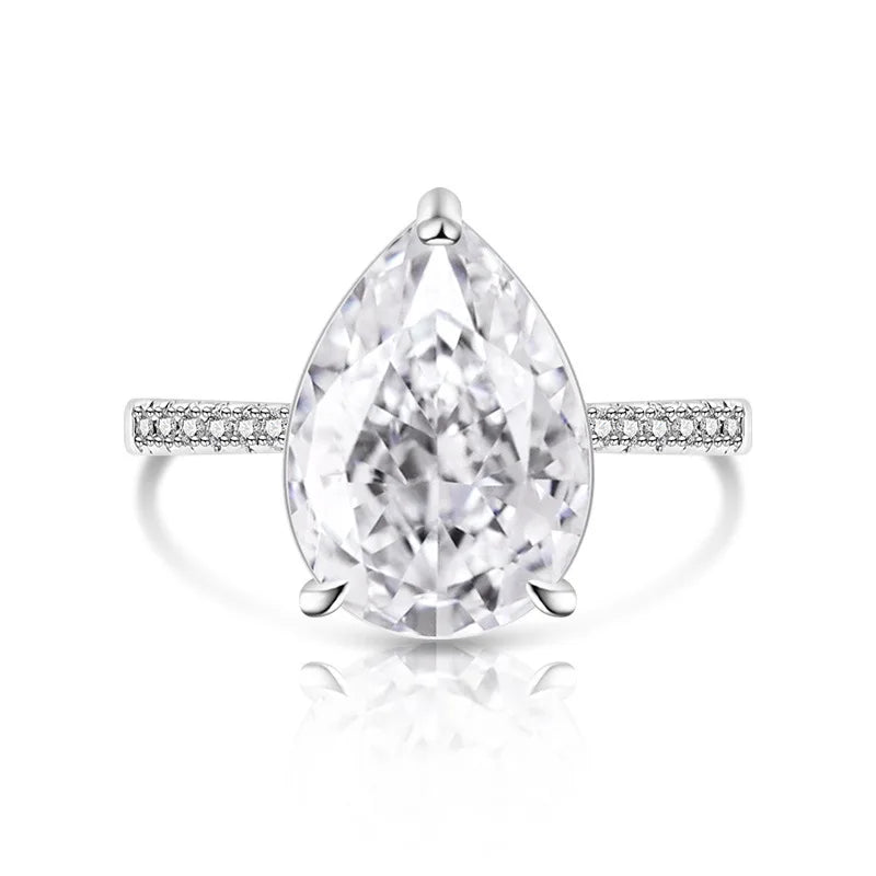 Pear-shaped diamond ring with a white background